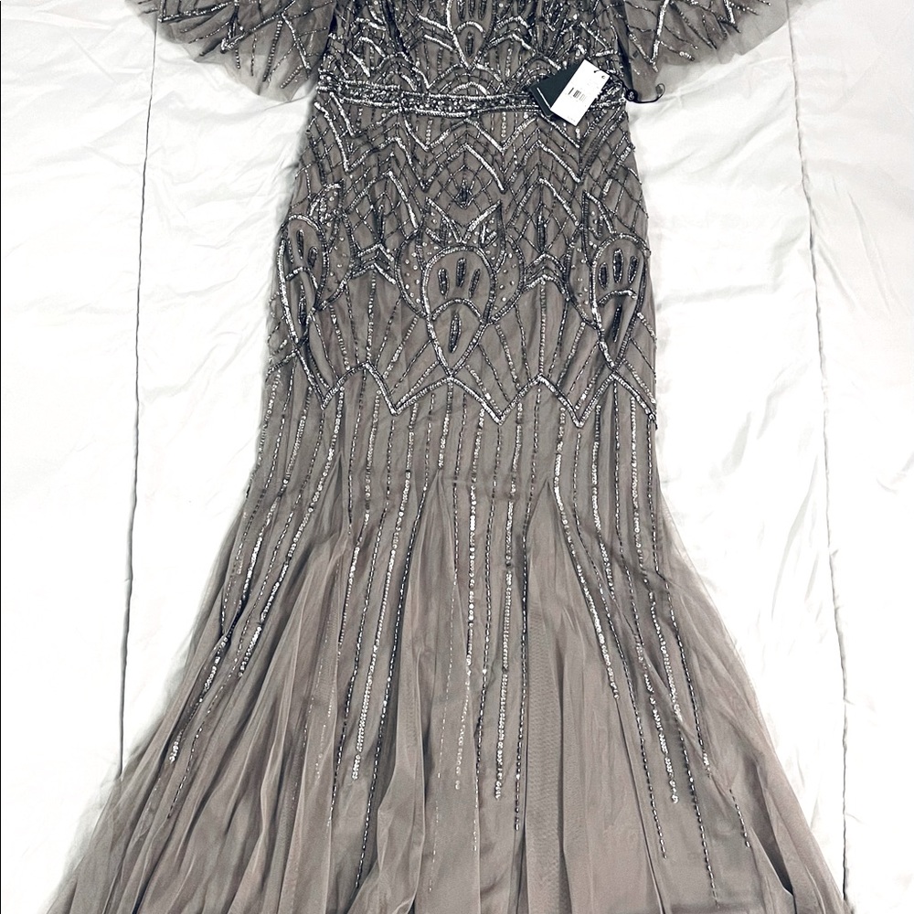 Beaded gown with godets